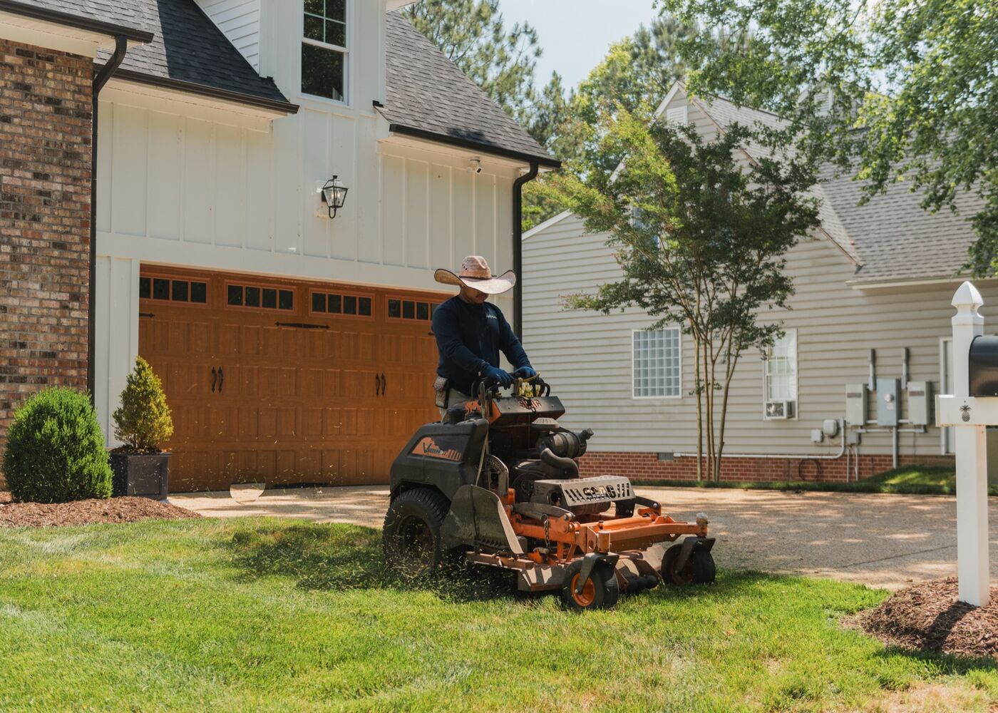 Crew mowing a property