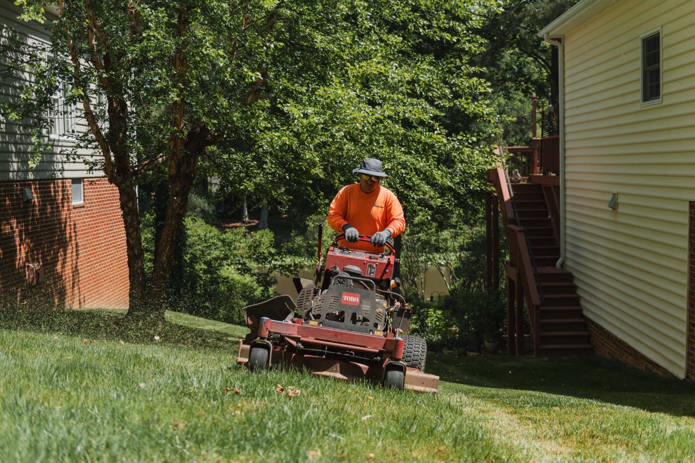 Crew on stand-on mower
